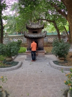 Man burning offerings for his ancestors