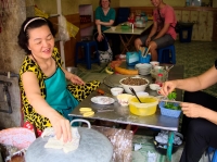 Woman making rice dumplings