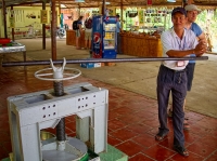 Pressing coconut into candy