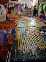 Pressing the candy into strips